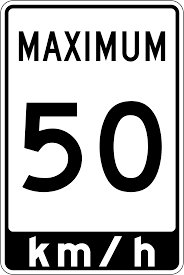 Road sign for the question: What does a white rectangular sign with black letters indicate?